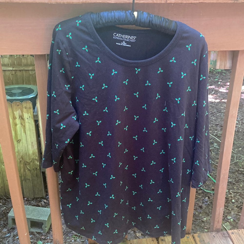 Catherine’s black Christmas holly T-shirt